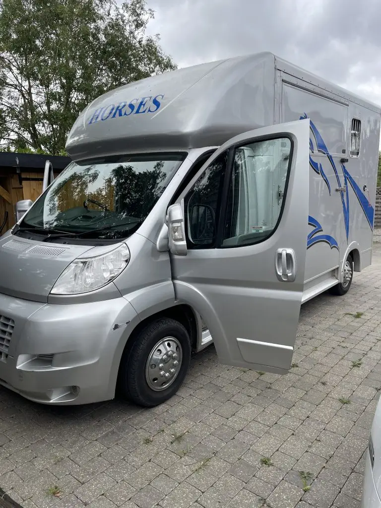 Fire Safety Stick mounted on the wall inside a horse stable, providing essential, residue-free fire protection for equestrian property and horseboxes.